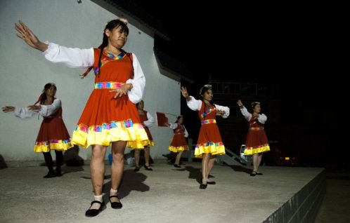Dancing group in a village